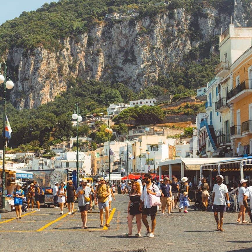 tourists on the sea promenade of capri island