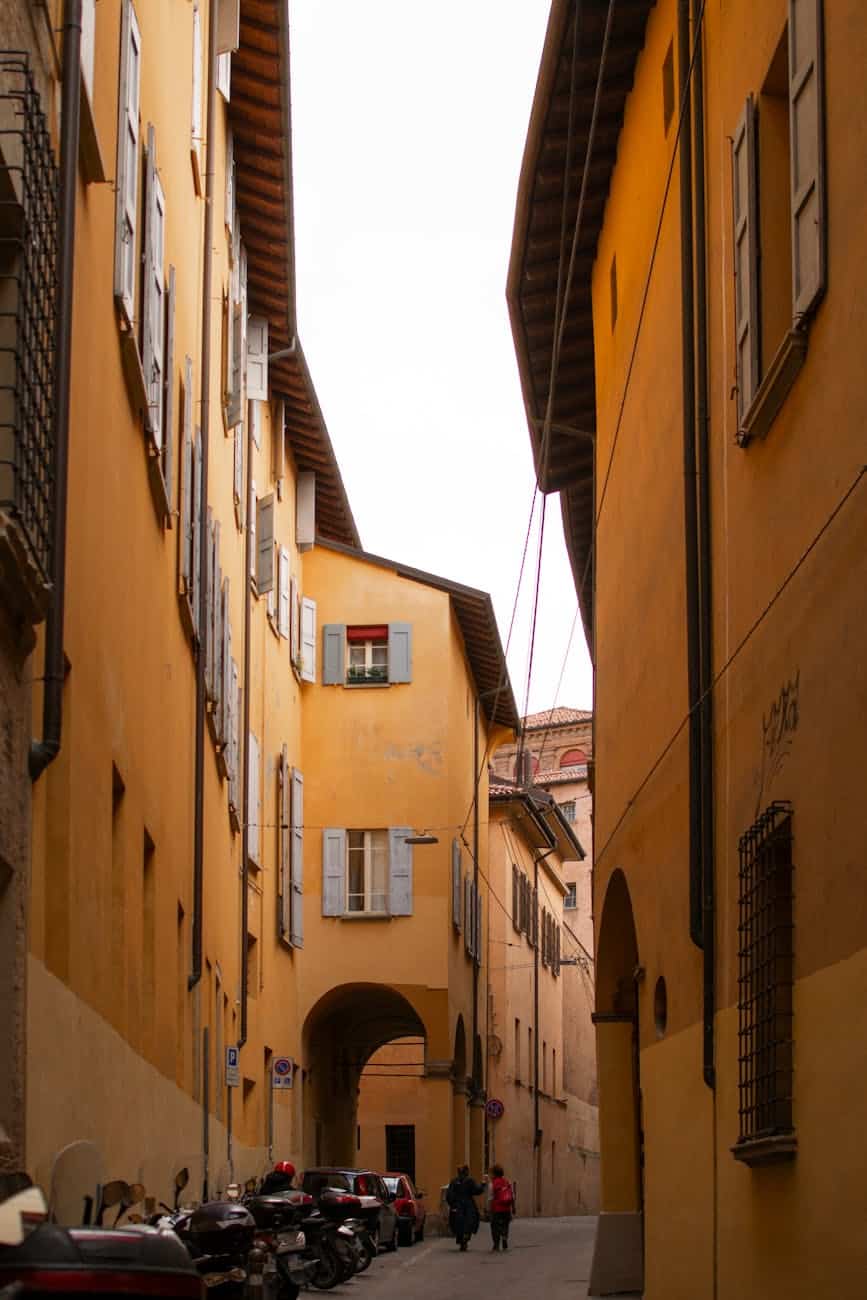 charming narrow street in bologna italy