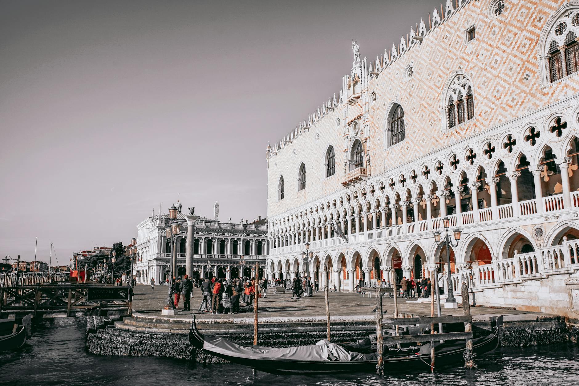 tourists in front of palazzo ducale in venice italy