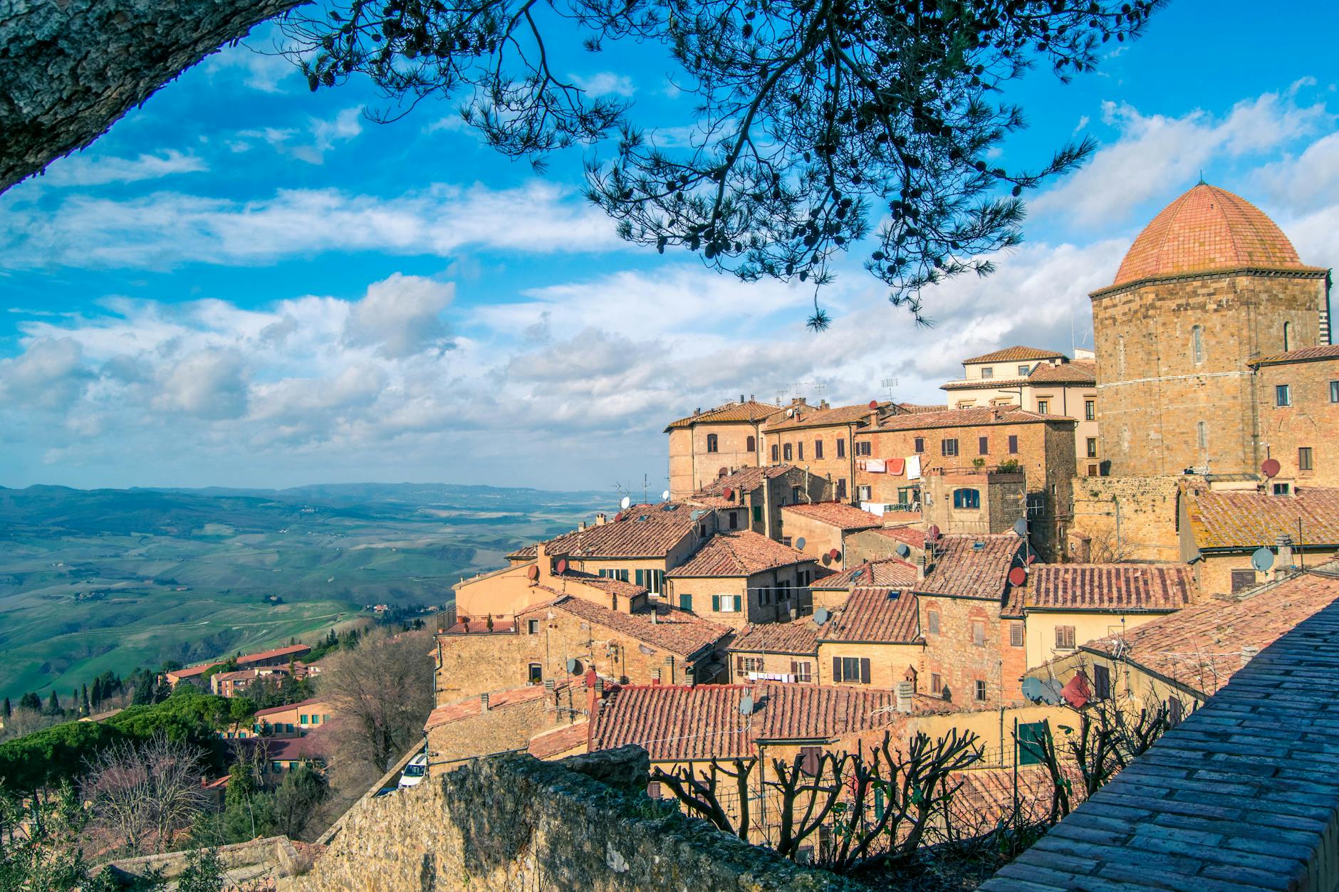 the view of an old town from a hilltop